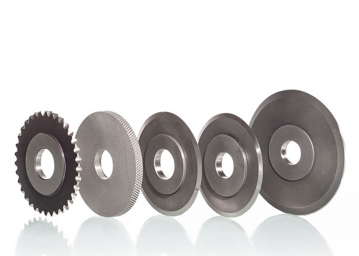 Abbildung verschiedener Rundmesser u.a. Profilmesser und Perforiermesser von DIENES