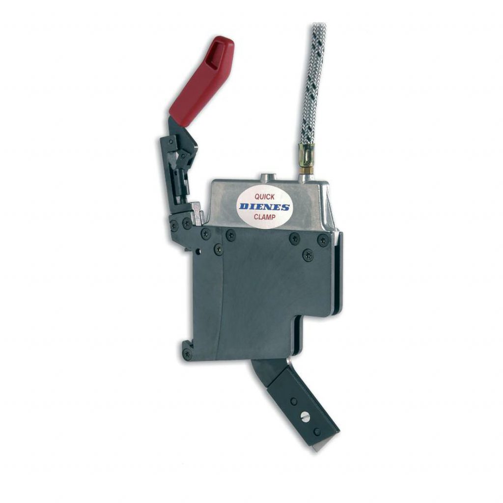 La photo montre le porte-lames PQDS R à commande mécanique ou pneumatique, avec système de serrage rapide "Quick-Clamp" à partir d'une largeur de coupe de 6 mm.